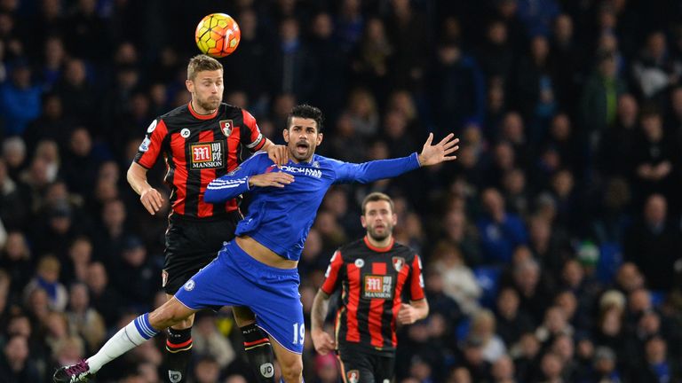 Diego Costa jumps for a header with Simon Francis - the Chelsea man started on the bench again