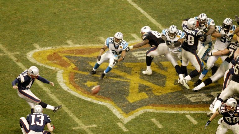 Adam Vinatieri of the Patriots kicks the game-winning field goal against the Panthers