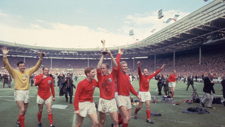 Sir Bobby Charlton lifts the 1966 World Cup with his England team-mates at Wembley