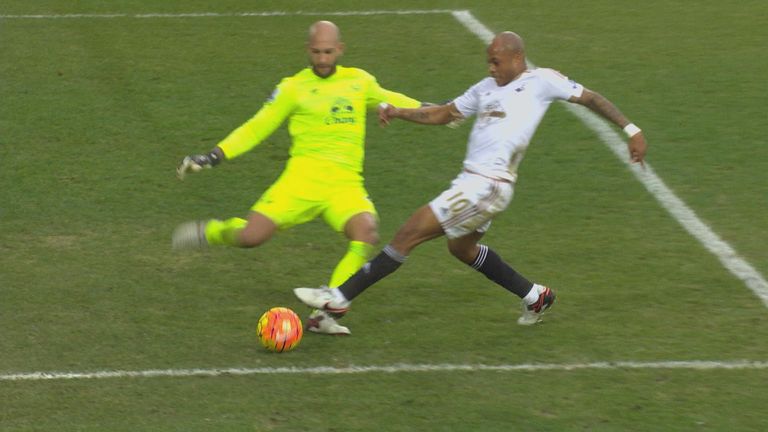 Tim Howard took out Andre Ayew to hand Swansea a penalty