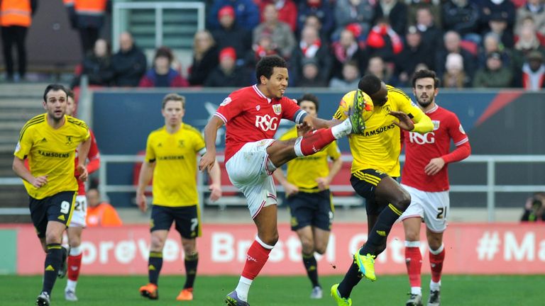 Bristol City's Korey Smith (left) and Middlesbrough's Albert Adomah in action