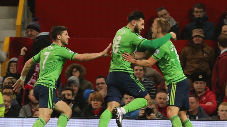 Charlie Austin of Southampton celebrates scoring their winning goal at Old Trafford