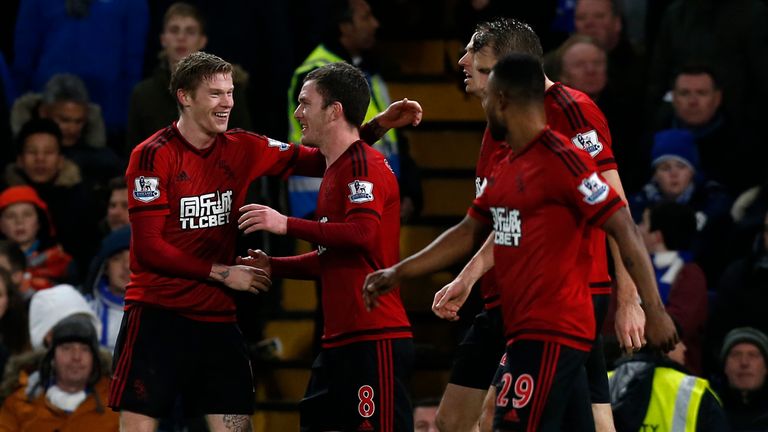 James McClean celebrates his late equaliser at Chelsea