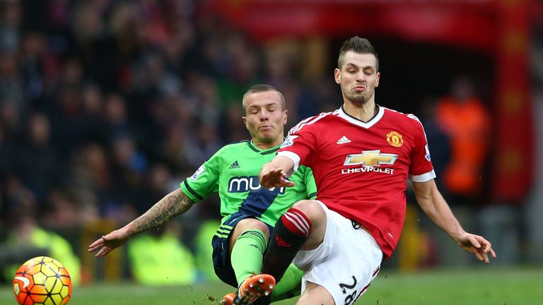 Morgan Schneiderlin (right) and Jordy Clasie crunch into a tackle