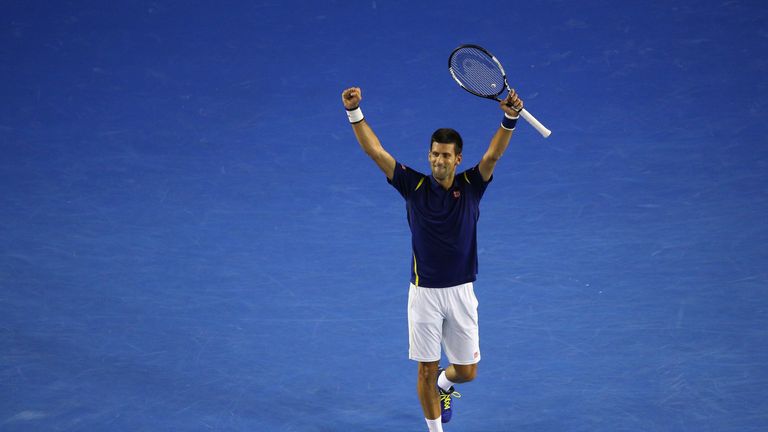 The world No 1 celebrates his four-set win