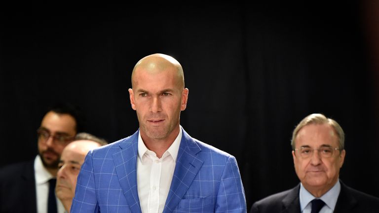 Zidane (L) with Real Madrid president Florentino Perez