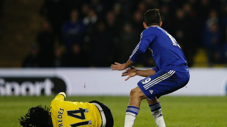 Costa and Juan Carlos Paredes (left) tangled just before half-time