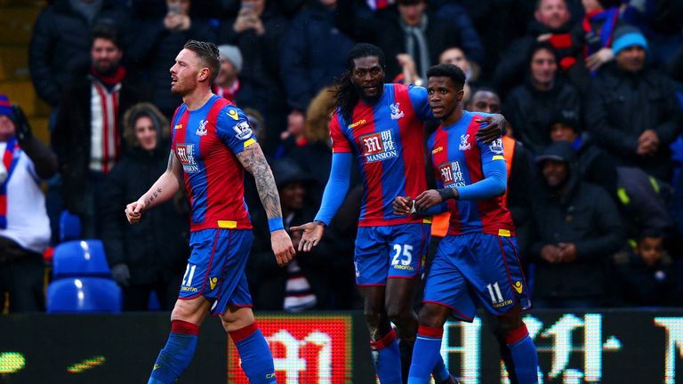 Emmanuel Adebayor is congratulated after equalising for Palace
