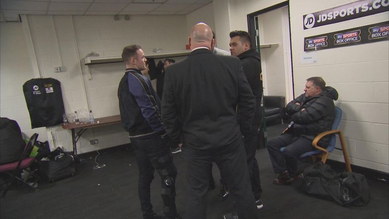 Rooney visits Scott Quigg on Saturday with his knee braced (Sky Sports Box Office)