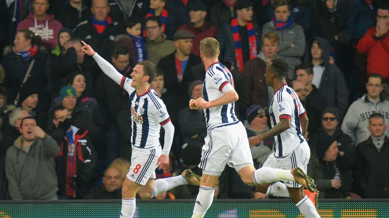 Craig Gardner (L) celebrates scoring the opening goal in the first half