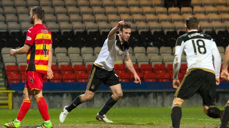 Andrew Considine (middle) celebrates after equalising against Partick