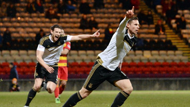 Aberdeen striker Simon Church (right) scores the winner at Partick