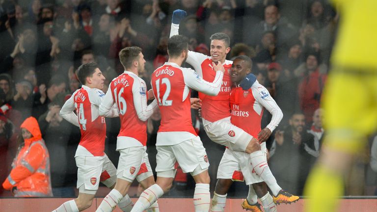 Joel Campbell is congratulated after scoring for Arsenal