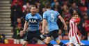 Spurs close gap on Leicester