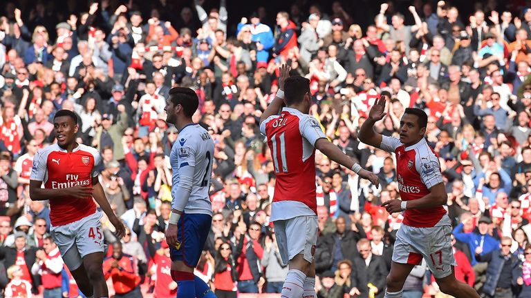 Sanchez celebrates after heading past Wayne Hennessey