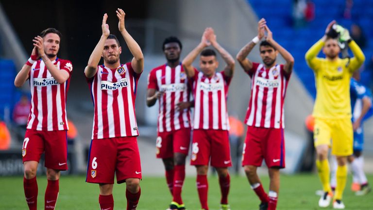 Atletico Madrid players applaud their supporters after another triumph