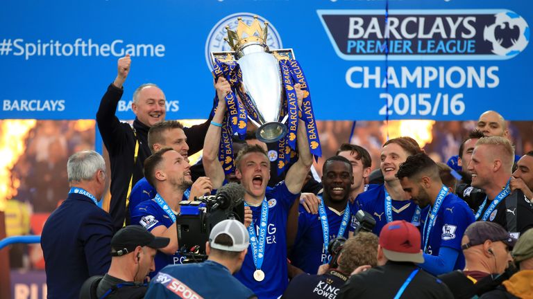 Vardy lifts the Premier League trophy following the victory over Everton