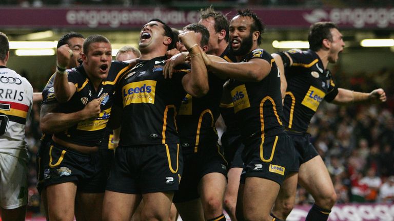 Jordan Tansey (L) of the Rhinos celebrates with teammates after scoring the match winning try in injury time