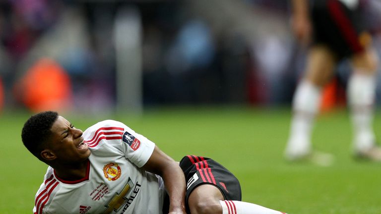 Marcus Rashford suffered a suspected knee injury during the FA Cup final