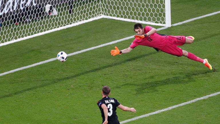 Albania's Ermir Lenjani somehow misses with the goal at his mercy