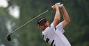 Walker reclaims lead from Day