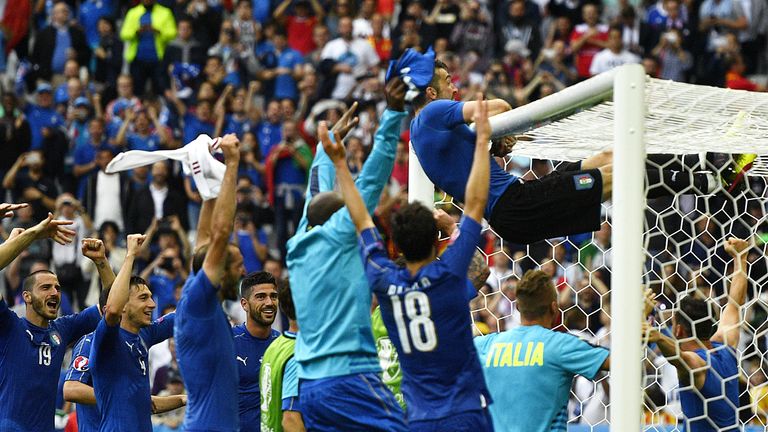 Italy players celebrate their 2-0 win over Spain