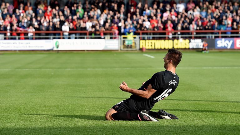 Marko Grujic celebrates his debut goal for Liverpool as he opens the scoring