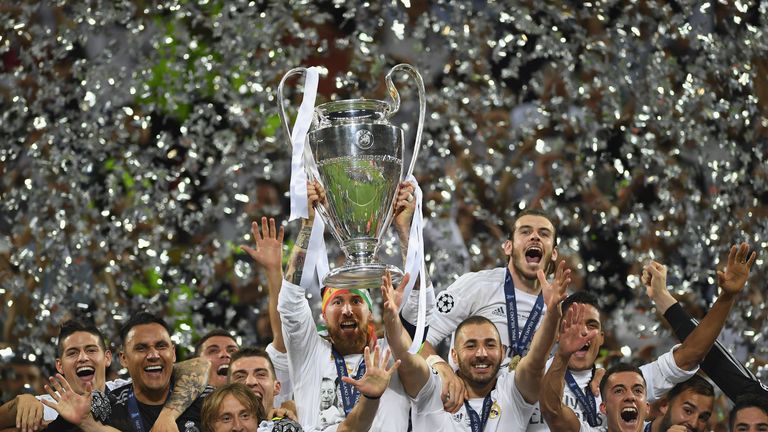Sergio Ramos of Real Madrid lifts the Champions League trophy after victory over City rivals Atletico Madrid in May