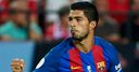 Suarez pleased with suspension