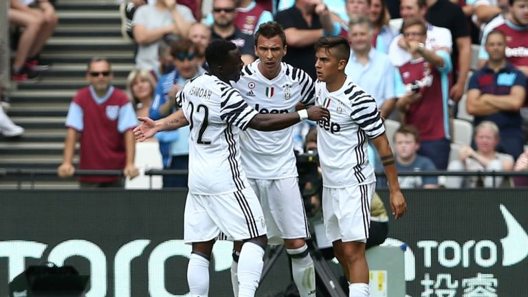 Mario Mandzukic (middle) celebrates goal for Juventus