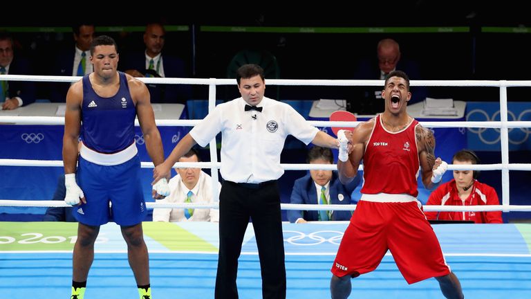 Tony Yoka celebrates his narrow win over Joe Joyce to win Rio 2016 Olympic gold
