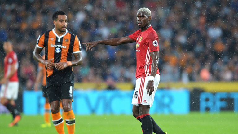 Pogba (right) has featured twice for Manchester United so far this season