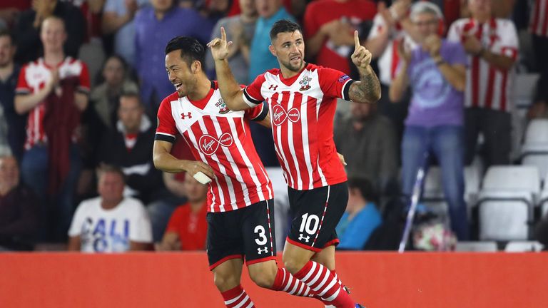  Charlie Austin celebrates scoring his teams opener 