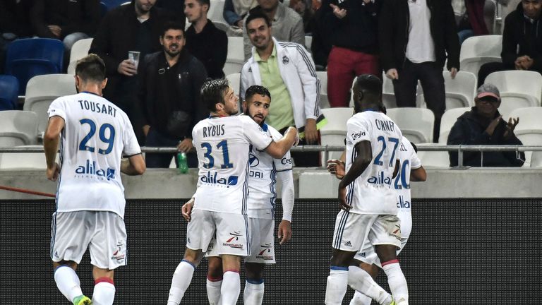 Nabil Fekir (C) celebrates with his team-mates after scoring in Lyon's 5-1 win at home to Montpellier