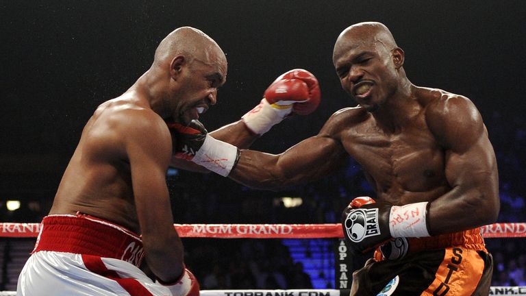 Timothy Bradley throws a right to the head of Joel Casamayor