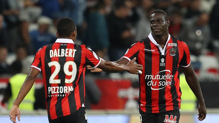 Nice's Italian forward Mario Balotelli (right) celebrates