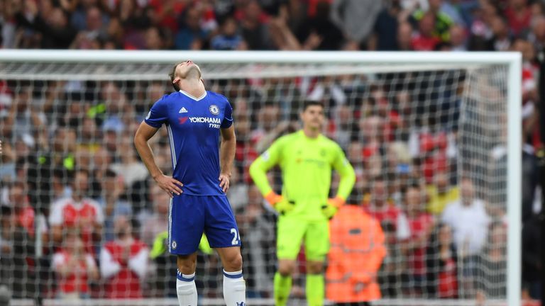 Gary Cahill looks to the sky after Arsenal score 