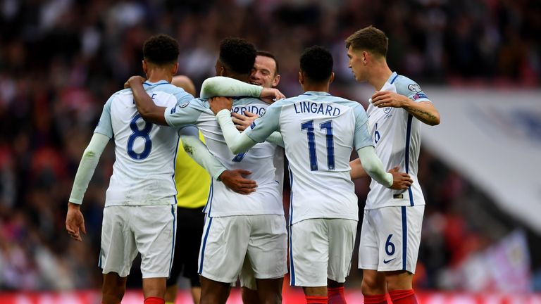 Daniel Sturridge celebrates   team-mates after scoring the opening goal of the game 