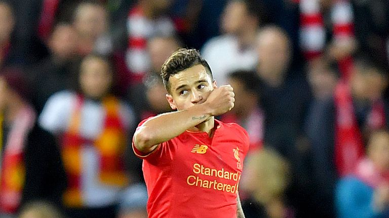 Liverpool's Philippe Coutinho celebrates after scoring the Reds' second goal