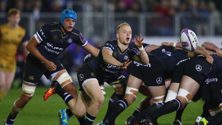Will Homer feeds a pass from the base of the scrum
