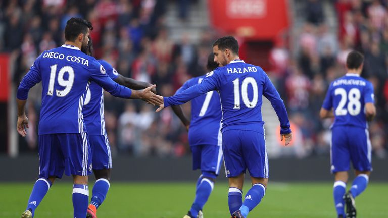 Eden Hazard of Chelsea (R) celebrates scoring his sides first goal