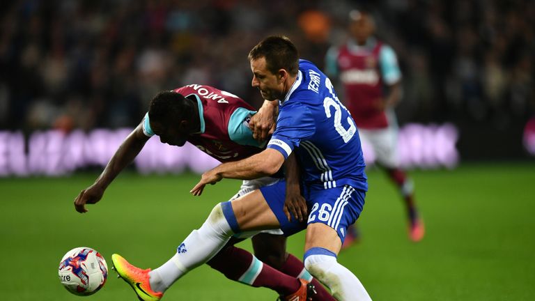  Michail Antonio and John Terry battle for possession 