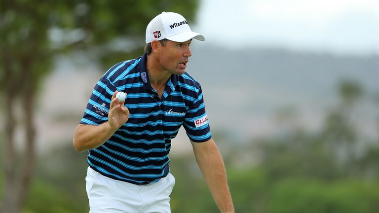 Padraig Harrington held his nerve to pip Andy Sullivan to the title