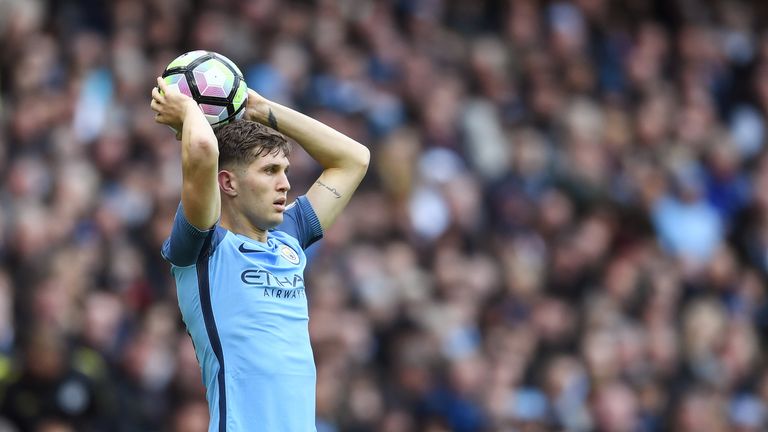 John Stones prepares to take a throw-in for City