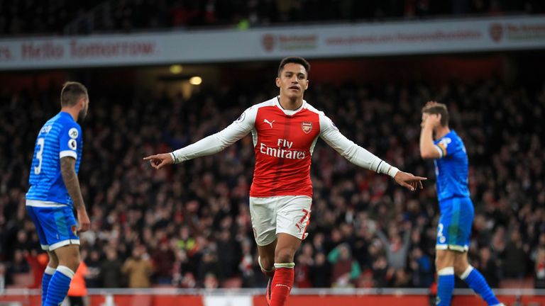Arsenal's Sanchez celebrates scoring his side's third goal