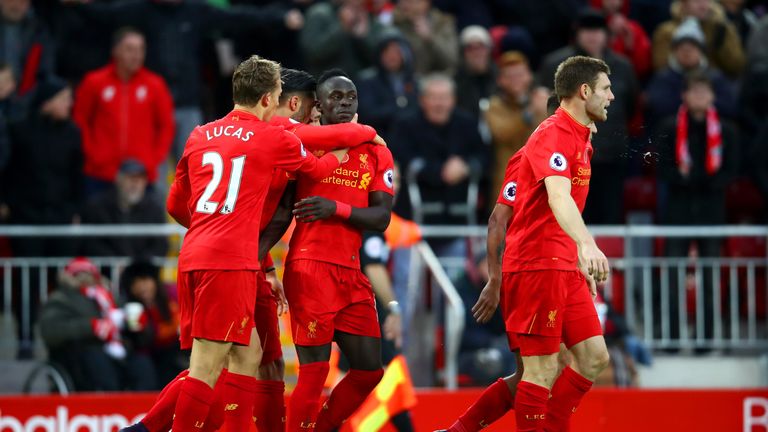 Sadio Mane celebrates scoring his second at Anfield