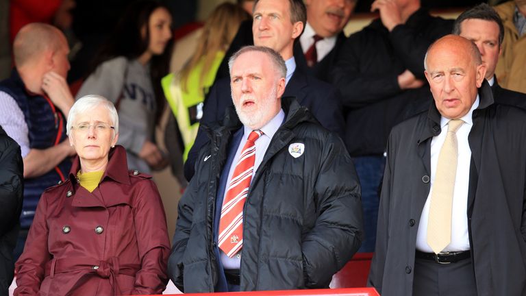 Barnsley owner Patrick Cryne (centre) says he does not expect to live until the end of the season
