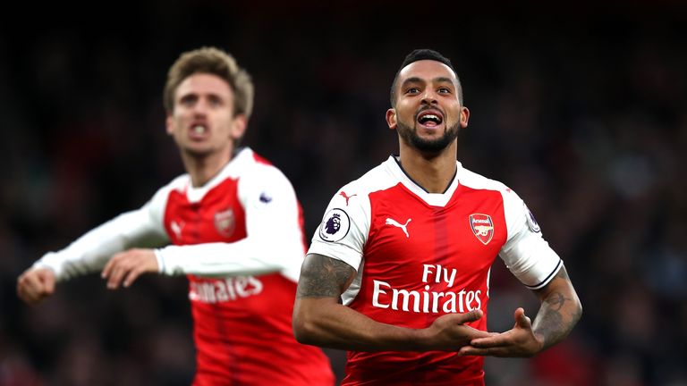 Theo Walcott celebrates putting Arsenal ahead in the second half