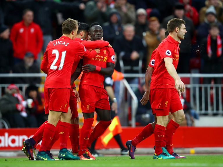 Sadio Mane of Liverpool celebrates scoring his second of the game 