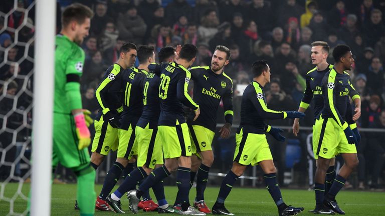 Arsenal's players celebrate Perez's first goal